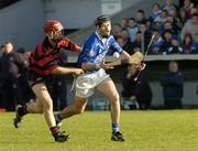10 October 2004; Sean Ryan, Mount Sion, is tackled by Niall O'Donnell, Ballygunner. Waterford Senior Hurling Final, Mount Sion v Ballygunner, Walsh Park, Waterford. Picture credit; Matt Browne / SPORTSFILE