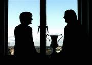 20 October 2004; Mairead Nixon, Dundalk LFC, right, and Sylvia Gee, UCD, at a photocall ahead of next weekend's 2004 FAI National Senior Cup Final between Dundalk LFC and UCD. Gravity Bar, Guinness Hopstore, Dublin. Picture credit; David Maher / SPORTSFILE