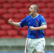 16 October 2004; Linfield's Aidan O Kane celebrates after scoring his sides first goal. Irish League, Linfield v Coleraine, Windsor Park, Belfast. Picture credit; SPORTSFILE