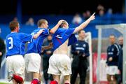 16 October 2004; Linfield's Andy Hunter celebrates after scoring his sides second goal. Irish League, Linfield v Coleraine, Windsor Park, Belfast. Picture credit; SPORTSFILE