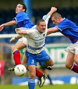 16 October 2004; Linfield's Michael Gault in action against Coleraine's Jody Tolan. Irish League, Linfield v Coleraine, Windsor Park, Belfast. Picture credit; SPORTSFILE