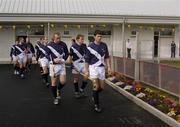 16 October 2004; The Scotland team walk onto the pitch. Senior Mens Hurling Shinty International, Ireland v Scotland, Rathoath GAA Club, Phairc Sean Eiffe, Co. Meath. Picture credit; Damien Eagers / SPORTSFILE