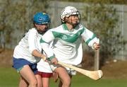 21 October 2004; Mary Murtagh, St. Wolstans, in action against Kate Mooney, Dominican College. Dublin Colleges Centenary Camogie Centenary 7 A side, Senior A final, Dominican College, Dublin, v St. Wolstans, Celbridge, Kildare, Naomh Marnog GAA Club, Portmarnock, Dublin. Picture credit; Pat Murphy / SPORTSFILE