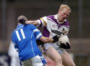 23 October 2004; Liam McBarron, Kilmacud Crokes, in action against Andy Jameson, St. Patrick's. AIB Leinster Club Football Championship, Kilmacud Crokes v St. Patrick's, Parnell Park, Dublin. Picture credit; David Maher / SPORTSFILE