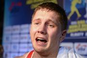 26 October 2013; A dejected Jason Quigley, Finn Valley BC, Donegal, representing Ireland, after defeat to Zhanibek Alimkhanuly, Kazakhstan, in their Men's Middleweight 75Kg Final bout. AIBA World Boxing Championships Almaty 2013, Almaty, Kazakhstan. Photo by Sportsfile