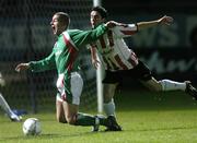 26 October 2004; John O'Flynn, Cork City, is tackled by Gareth McGlynn, Derry City. eircom league, Premier Division, Derry City v Cork City, Brandywell, Derry. Picture credit; David Maher / SPORTSFILE