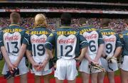 24 October 2004; Irish players, from left,  David Heaney, Ciaran McDonald, Paul Galvin, Graham Canty and Bryan Cullen wait to be introduced to the dignitaries before the game. Coca Cola International Rules Series 2004, Second Test, Ireland v Australia, Croke Park, Dublin. Picture credit; Brendan Moran / SPORTSFILE *** Local Caption *** Any photograph taken by SPORTSFILE during, or in connection with, the 2004 Coca Cola International Rules Series which displays GAA logos or contains an image or part of an image of any GAA intellectual property, or, which contains images of a GAA player/players in their playing uniforms, may only be used for editorial and non-advertising purposes.  Use of photographs for advertising, as posters or for purchase separately is strictly prohibited unless prior written approval has been obtained from the Gaelic Athletic Association.