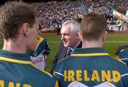 24 October 2004; An Taoiseach Bertie Ahern TD, is introduced to Irish players James Nallen, left, and Martin McGrath. Coca Cola International Rules Series 2004, Second Test, Ireland v Australia, Croke Park, Dublin. Picture credit; Brendan Moran / SPORTSFILE *** Local Caption *** Any photograph taken by SPORTSFILE during, or in connection with, the 2004 Coca Cola International Rules Series which displays GAA logos or contains an image or part of an image of any GAA intellectual property, or, which contains images of a GAA player/players in their playing uniforms, may only be used for editorial and non-advertising purposes.  Use of photographs for advertising, as posters or for purchase separately is strictly prohibited unless prior written approval has been obtained from the Gaelic Athletic Association.