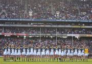 24 October 2004; The Irish team line up for the national anthems before the game. Coca Cola International Rules Series 2004, Second Test, Ireland v Australia, Croke Park, Dublin. Picture credit; Brendan Moran / SPORTSFILE *** Local Caption *** Any photograph taken by SPORTSFILE during, or in connection with, the 2004 Coca Cola International Rules Series which displays GAA logos or contains an image or part of an image of any GAA intellectual property, or, which contains images of a GAA player/players in their playing uniforms, may only be used for editorial and non-advertising purposes.  Use of photographs for advertising, as posters or for purchase separately is strictly prohibited unless prior written approval has been obtained from the Gaelic Athletic Association.