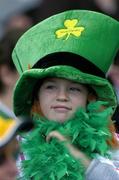 24 October 2004; A young Irish fan in the crowd. Coca Cola International Rules Series 2004, Second Test, Ireland v Australia, Croke Park, Dublin. Picture credit; Brendan Moran / SPORTSFILE *** Local Caption *** Any photograph taken by SPORTSFILE during, or in connection with, the 2004 Coca Cola International Rules Series which displays GAA logos or contains an image or part of an image of any GAA intellectual property, or, which contains images of a GAA player/players in their playing uniforms, may only be used for editorial and non-advertising purposes.  Use of photographs for advertising, as posters or for purchase separately is strictly prohibited unless prior written approval has been obtained from the Gaelic Athletic Association.
