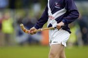 16 October 2004; A Scotland player holds his shinty stick. Ladies Camogie Shinty International, Ireland v Scotland, Rathoath GAA Club, Phairc Sean Eiffe, Co. Meath. Picture credit; Damien Eagers / SPORTSFILE