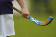 16 October 2004; A Scotland player holds her Shinty stick. Ladies Camogie Shinty International, Ireland v Scotland, Rathoath GAA Club, Phairc Sean Eiffe, Co. Meath. Picture credit; Damien Eagers / SPORTSFILE