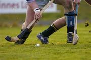 16 October 2004; A Scotland player and an Ireland player tussle for possession. Senior Mens Hurling Shinty International, Ireland v Scotland, Rathoath GAA Club, Phairc Sean Eiffe, Co. Meath. Picture credit; Damien Eagers / SPORTSFILE