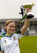 16 October 2004; Ireland captain Anna Geary lifts the cup. Ladies Camogie Shinty International, Ireland v Scotland, Rathoath GAA Club, Phairc Sean Eiffe, Co. Meath. Picture credit; Damien Eagers / SPORTSFILE