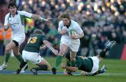 13 November 2004; Brian O'Driscoll, Ireland, in action against Marius Joubert (13) and De Wet Barry (12), South Africa. Rugby International, Ireland v South Africa, Lansdowne Road, Dublin. Picture credit; Brendan Moran / SPORTSFILE