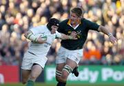 13 November 2004; Johnny O'Connor, Ireland, is tackled by John Bakkies Botha, South Africa. Rugby International, Ireland v South Africa, Lansdowne Road, Dublin. Picture credit; Matt Browne / SPORTSFILE