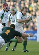 13 November 2004; Denis Hickie, Ireland, supported by team-mates John Hayes and Anthony Horgan, in action against John Smit, South Africa. Rugby International, Ireland v South Africa, Lansdowne Road, Dublin. Picture credit; Brendan Moran / SPORTSFILE