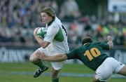 13 November 2004; Brian O'Driscoll, Ireland, in action against Jaco van der Westhuizen, South Africa. Rugby International, Ireland v South Africa, Lansdowne Road, Dublin. Picture credit; Brendan Moran / SPORTSFILE