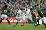13 November 2004; Geordan Murphy, Ireland, supported by team-mate Brian O'Driscoll, in action against Ashwin Willemse (11) and Maruis Joubert, South Africa. Rugby International, Ireland v South Africa, Lansdowne Road, Dublin. Picture credit; Brendan Moran / SPORTSFILE