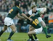 13 November 2004; Brian O'Driscoll, Ireland, in action against Jaco van der Westhuizen (10) and De Wet Barry (12), South Africa. Rugby International, Ireland v South Africa, Lansdowne Road, Dublin. Picture credit; Brendan Moran / SPORTSFILE