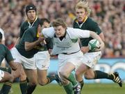 13 November 2004; Brian O'Driscoll, Ireland, is tackled by Fourie Du Preez, South Africa. Rugby International, Ireland v South Africa, Lansdowne Road, Dublin. Picture credit; Matt Browne / SPORTSFILE