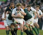 13 November 2004; Brian O'Driscoll, Ireland, is tackled by Victor Matfield and John Bakkies Botha, right, South Africa. Rugby International, Ireland v South Africa, Lansdowne Road, Dublin. Picture credit; Matt Browne / SPORTSFILE