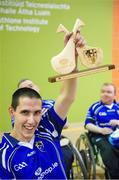 2 November 2013; Munster captain Gary O'Halloran, from Clarina, Limerick, celebrates with the trophy after beating Connacht in the final of the M.Donnelly GAA Wheelchair Hurling Inter-Provincial Tournament. Athlone Institute of Technology, Athlone, Co. Westmeath. Picture credit: Ray McManus / SPORTSFILE