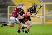 3 November 2013; Garrett Sinnott, Oulart the Ballagh, in action against John Phelan, Clara. AIB Leinster Senior Club Hurling Championship, Quarter-Final, Clara, Kilkenny v Oulart the Ballagh, Wexford. Nowlan Park, Kilkenny. Picture credit: Matt Browne / SPORTSFILE