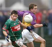 21 November 2004; Paul McGarry, Ballina Stephenites, in action against Cathal Kilcline, Roscommon Gaels. AIB Connacht Club Senior Football Championship Semi-Final, Ballina Stephenites v Roscommon Gaels, James Stephen's Park, Ballina, Co. Mayo. Picture credit; David Maher / SPORTSFILE