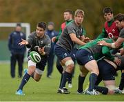 5 November 2013; Ireland scrum-half Conor Murray, watched by Chris Henry, in action during squad training ahead of their Guinness Series International match against Samoa on Saturday. Ireland Rugby Squad Training, Carton House, Maynooth, Co. Kildare. Picture credit: Brendan Moran / SPORTSFILE