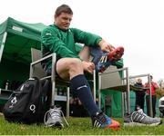 5 November 2013; Ireland's Brian O'Driscoll puts on his boots before squad training ahead of their Guinness Series International match against Samoa on Saturday. Ireland Rugby Squad Training, Carton House, Maynooth, Co. Kildare. Picture credit: David Maher / SPORTSFILE