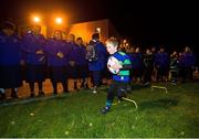 5 November 2013; Special olympic athlete Joe Whelan, age 10, from Seapoint Dragons Rugby Club, is watched by members of the Samoan Rugby team after they performed the traditional war haka for Special Olympics athletes from Seapoint Dragons Rugby Club, at the Wanderers RFC grounds on Merrion Road. The Samoan players performed the haka as their good deed as part of Electric Ireland’s Powering Kindness campaign. Special Olympics Ireland are one of three charities vying to win €50,000 be encouraging members of the public to log good deeds and pledge them to Special Olympics Ireland on poweringkindness.ie. Wanderers RFC, Dublin. Picture credit: David Maher / SPORTSFILE