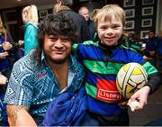 5 November 2013; Special olympic athlete Joe Whelan, age 10, from Seapoint Dragons Rugby club, pictured with Samoan player Logovi'i Mulipola, after the Samoan Rugby team performed their traditional war haka for Special Olympics athletes from Seapoint Dragons Rugby Club, at the Wanderers RFC grounds on Merrion Road. The Samoan players performed the haka as their good deed as part of Electric Ireland’s Powering Kindness campaign. Special Olympics Ireland are one of three charities vying to win €50,000 be encouraging members of the public to log good deeds and pledge them to Special Olympics Ireland on poweringkindness.ie. Wanderers RFC, Dublin. Picture credit: David Maher / SPORTSFILE