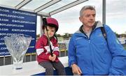 10 November 2013; Owner Michael O'Leary, CEO of Ryanair, with Alan Jordan aged 4, from Navan, Co. Meath, in the winners enclosure after winning the Boylesports.com Download Our App Lismullen Hurdle with Dedigout. Navan Racecourse, Navan, Co. Meath. Picture credit: Barry Cregg / SPORTSFILE