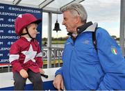 10 November 2013; Owner Michael O'Leary, CEO of Ryanair, with Alan Jordan aged 4, from Navan, Co. Meath, in the winners enclosure after winning the Boylesports.com Download Our App Lismullen Hurdle with Dedigout. Navan Racecourse, Navan, Co. Meath. Picture credit: Barry Cregg / SPORTSFILE