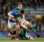 9 November 2013; Johnny Leota, Samoa, is tackled by Devin Toner and Jack McGrath, Ireland. Guinness Series International, Ireland v Samoa, Aviva Stadium, Lansdowne Road, Dublin. Picture credit: Stephen McCarthy / SPORTSFILE