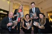 12 November 2013; Author Donal Keenan, left, with members of Páidí Ó Sé's family, from left to right, daughter Siún, wife Máire, son Pádrig Og and daughter Neasa, in attendance at the launch of his book &quot;Páidí - A big life&quot;. Launch of Páidí Ó Sé Book, D4 Ballsbridge Hotel, Ballsbridge Dublin. Picture credit: Barry Cregg / SPORTSFILE