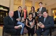 12 November 2013; Author Donal Keenan, left, and former Taoiseach Brian Cowen, right, with members of Páidí Ó Sé's family, from left to right, nephew Marc Ó Sé, daughter Siún, wife Máire, daughter Neasa and son Pádraig Og in attendance at the launch of his book &quot;Páidí - A big life&quot;. Launch of Páidí Ó Sé Book, D4 Ballsbridge Hotel, Ballsbridge Dublin. Picture credit: Barry Cregg / SPORTSFILE