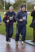 25 December 2004; Former Dublin players Jim, left, and Bernard Brogan 'competing' during one of the many 'Goal Mile' races on Christmas Day. Annual Goal Mile, Belfield, Dublin. Picture credit; Ray McManus / SPORTSFILE