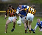 9 January 2005; Paul Lalor, Laois, in action against Sean Flynn and  Alan Murphy, 6, Kilkenny. O'Byrne Cup, Quarter-Final, Kilkenny v Laois, Pairc Lachtain, Freshford, Co. Kilkenny. Picture credit; Matt Browne / SPORTSFILE