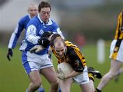 9 January 2005; Alan Murphy, Kilkenny, in action against Chris Conway, Laois. O'Byrne Cup, Quarter-Final, Kilkenny v Laois, Pairc Lachtain, Freshford, Co. Kilkenny. Picture credit; Matt Browne / SPORTSFILE