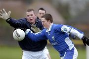 9 January 2005; Paul Lalor, Laois, in action against Stephen Murphy, Kilkenny Goalkeeper. O'Byrne Cup, Quarter-Final, Kilkenny v Laois, Pairc Lachtain, Freshford, Co. Kilkenny. Picture credit; Matt Browne / SPORTSFILE