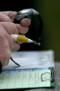 9 January 2005; Pierce Freaney, the Leinster referees administrator, notes the names and times of substitutes and sin bin players during the game. O'Byrne Cup, Quarter-Final, Kildare v Meath, St. Conleth's Park, Newbridge, Co. Kildare. Picture credit; Ray McManus / SPORTSFILE