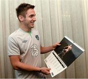 14 November 2013; Republic of Ireland's Kevin Doyle shows his support for the Spot the Ballers 2014 calendar. Portmarnock Hotel & Golf Links, Portmarnock, Co. Dublin. Picture credit: David Maher / SPORTSFILE