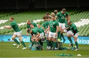 15 November 2013; Ireland players break from their team photograph during the captain's run ahead of their Guinness Series International match against Australia on Saturday. Ireland Rugby Squad Captain's Run, Aviva Stadium, Lansdowne Road, Dublin. Picture credit: Stephen McCarthy / SPORTSFILE