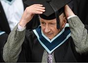 14 November 2013; Cathal Furey, from Annadown, Co. Galway, adjusts his mortarboard following his Setanta College graduation awards ceremony. Carton House, Maynooth, Co. Kildare. Picture credit: Stephen McCarthy / SPORTSFILE
