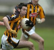 9 January 2005; Michael Grace, Kilkenny, in action against Laois' Kieran Kelly. O'Byrne Cup, Quarter-Final, Kilkenny v Laois, Pairc Lachtain, Freshford, Co. Kilkenny. Picture credit; Matt Browne / SPORTSFILE