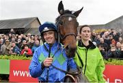 17 November 2013; Hurricane Fly, with Ruby Walsh, in the winners enclosure with groom Gail Carlisle after winning the StanJames.com Morgiana Hurdle. Hurricane Fly became the first horse ever to win 17 Grade 1 races. Punchestown Racecourse, Punchestown, Co. Kildare. Picture credit: Barry Cregg / SPORTSFILE