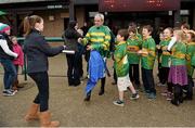 17 November 2013; Jockey Ruby Walsh is greeted by children from Ballymore GAA Club after he rode Hurricane Fly to win the StanJames.com Morgiana Hurdle. Hurricane Fly became the first horse ever to win 17 Grade 1 races. Punchestown Racecourse, Punchestown, Co. Kildare. Picture credit: Barry Cregg / SPORTSFILE
