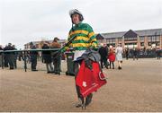 17 November 2013; Jockey Ruby Walsh makes his way back to the weigh room after he rode City Slicker to win the Go Racing In Kildare 2014 Membership Handicap Hurdle, and his fifth win from five starts. Punchestown Racecourse, Punchestown, Co. Kildare. Picture credit: Barry Cregg / SPORTSFILE